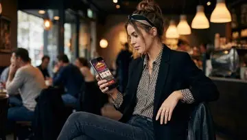 young woman playing on her mobile 