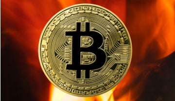 a bitcoin against a fiery red background