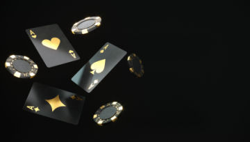black and gold Poker cards and chips floating against a black background