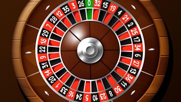 birds eye view of a roulette wheel on a brown background