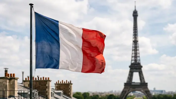 France's flag with Eiffel Tower in the background 
