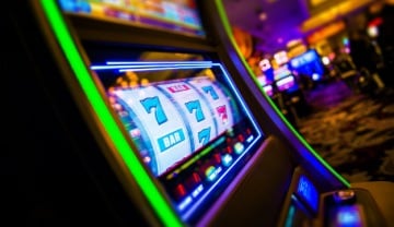 a brightly lit up slot machine in a casino