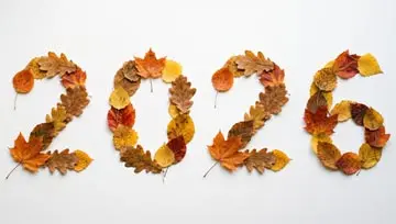 2026 on autumn-colored leaves