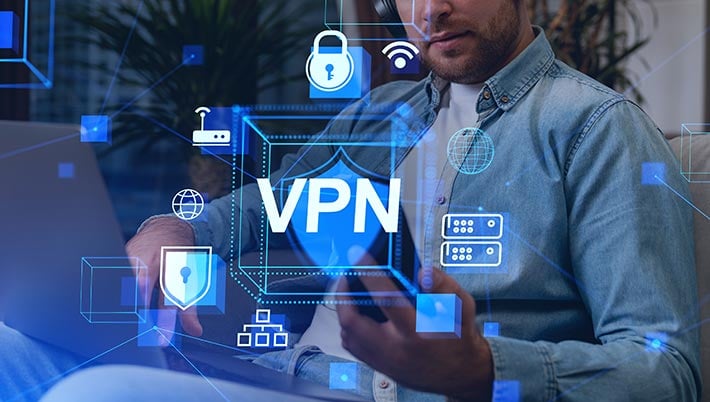 man working on VPN-protected devices