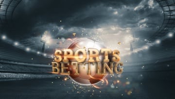 a big gold globe with the letters Sports Betting sitting in the middle of a sports stadium