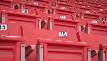 empty seats in an empty sports stadium