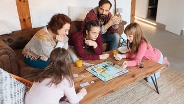 family playing a board game