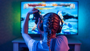 girl playing video game  
