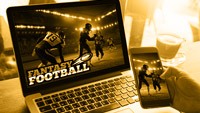 A laptop and a mobile phone each with a Fantasy Football app on the screen