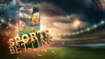 mobile phone with the words Sports Betting and gold coins on the background of a sports stadium