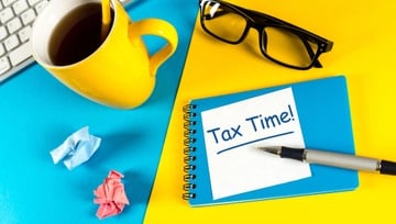 a table set out to work on tax forms