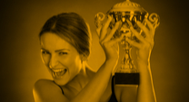 woman holding trophy