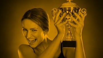 woman holding trophy