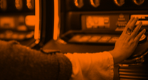 woman's hand playing a slot machine